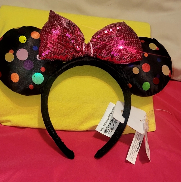 Disney World Other - Disneys Minnie Mouse ear headband with a sequined bow and polka dot ears. NWT